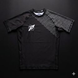 Platinum Jiu Jitsu Black Short Sleeve Rash Guard featuring white chest logo and signature patterned side panels for No-Gi grappling and MMA training.